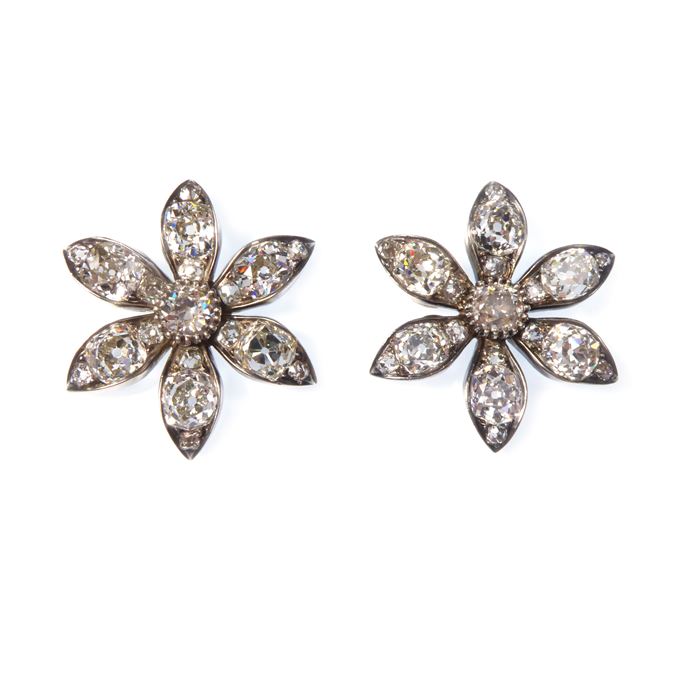 Pair of cushion cut diamond six petal flower brooches | MasterArt